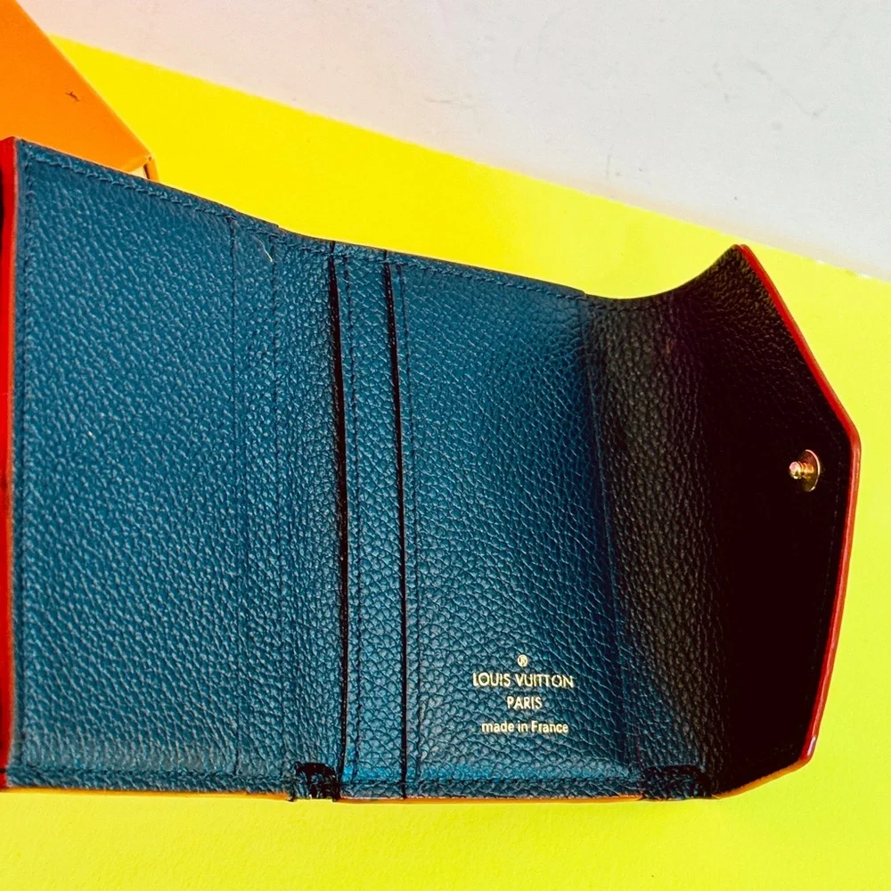 Louis Vuitton Black Embossed Monogram Compact Wallet with Red Trim